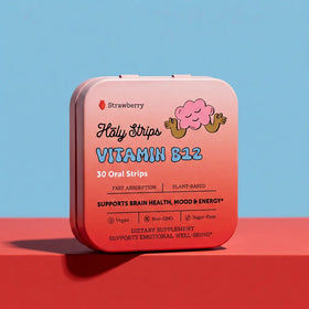 A pink metal tin labeled HolyStrips® Vitamin B12 by Holy Strips, with 30 vegan, strawberry-flavored B12 oral strips for energy support.